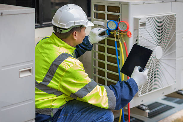 Professional Heat Pump Repair technician working in Moulton, AL